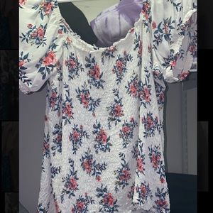 fun white half top with flowers and cute sleeves!